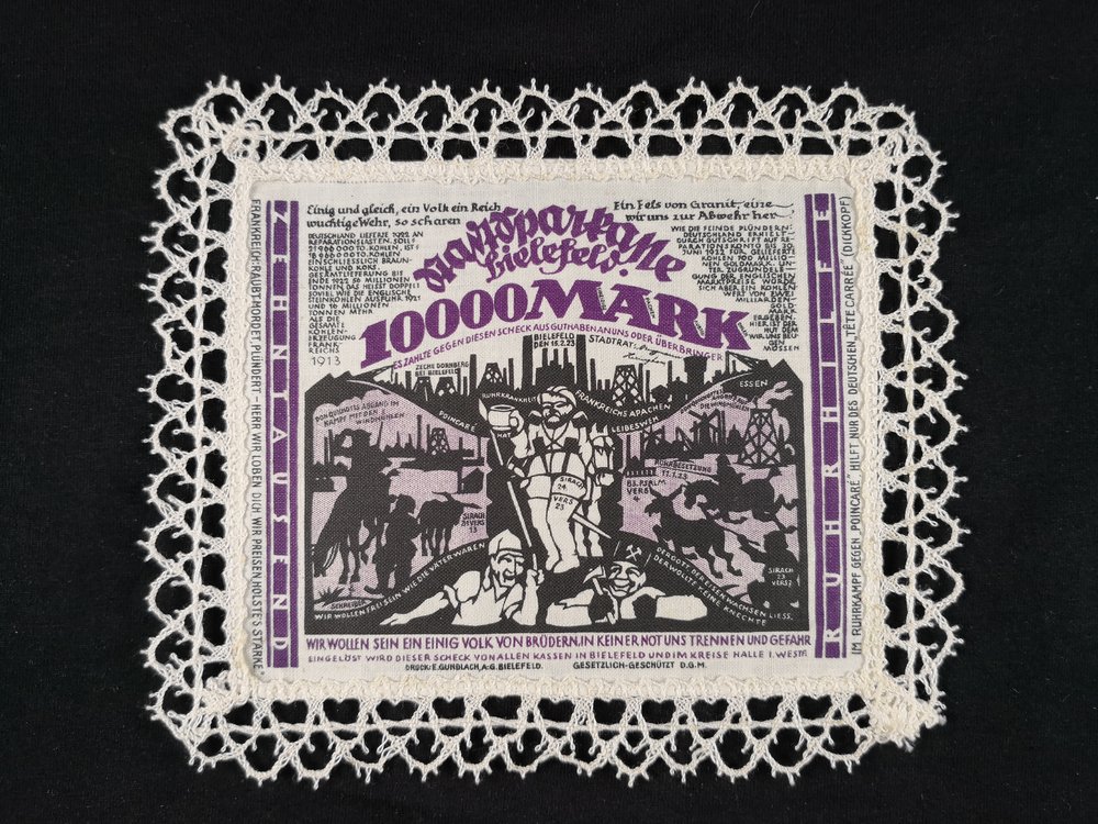 Bielefeld 1923 10000 Mark Linen dark violet black with thick cream lace border