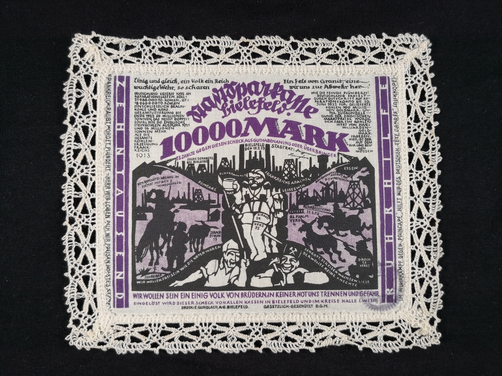Bielefeld 1923 Linen 10000-Mark dark violet with patterned cream lace border
