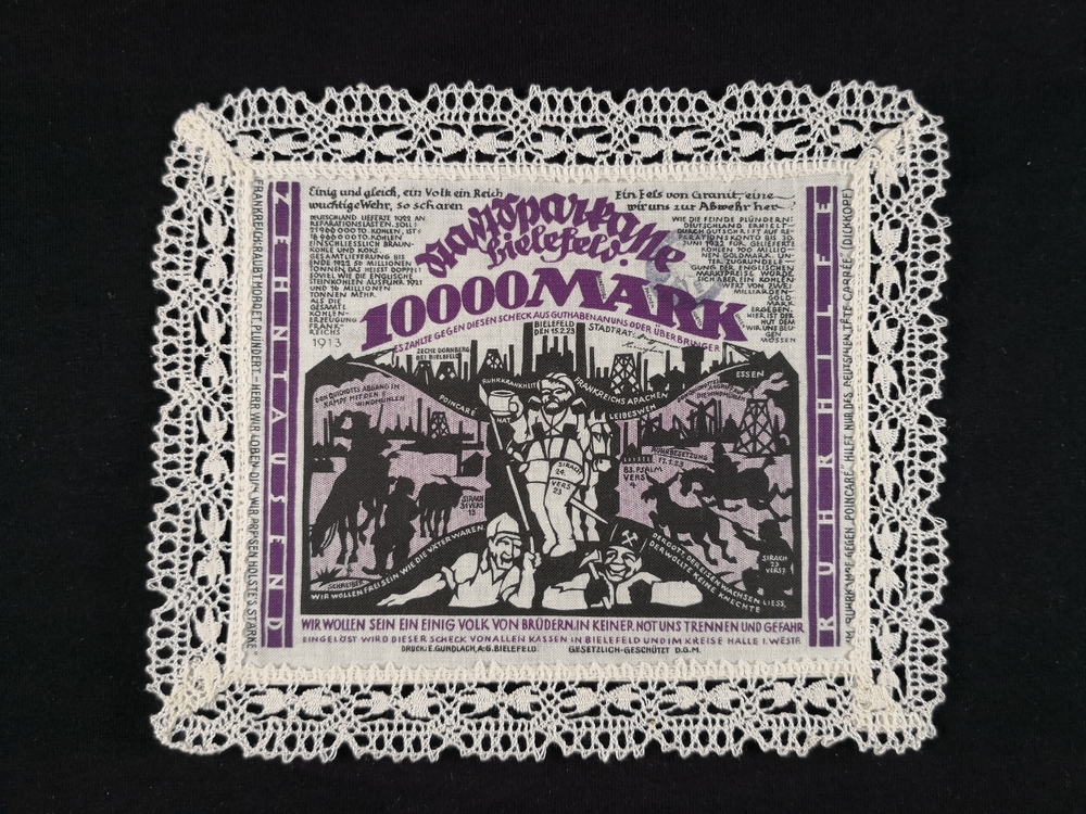 Bielefeld 1923 Linen 10000 Mark dark violet with hemmed patterned cream lace border