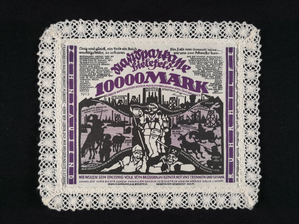 Bielefeld 1923 Linen 10000 Mark with white lace border dark violet black